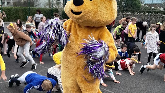 Pudsey bear cheerleading children
